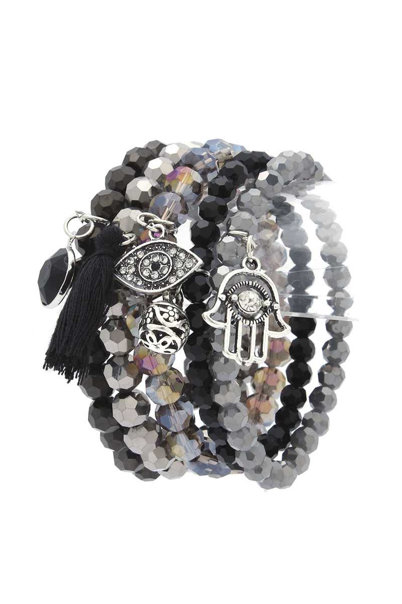 Bracelet empilable à pompon avec breloque main de Hamsa mauvais œil