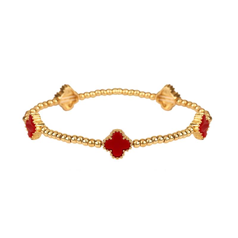 Bracelet extensible en métal avec station de fleurs