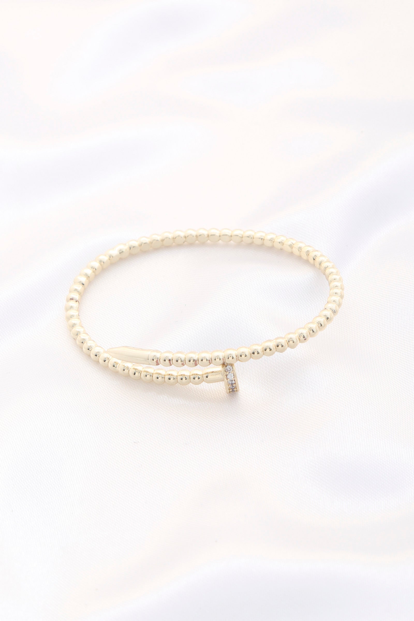 Bracelet jonc en métal et clous en cristal