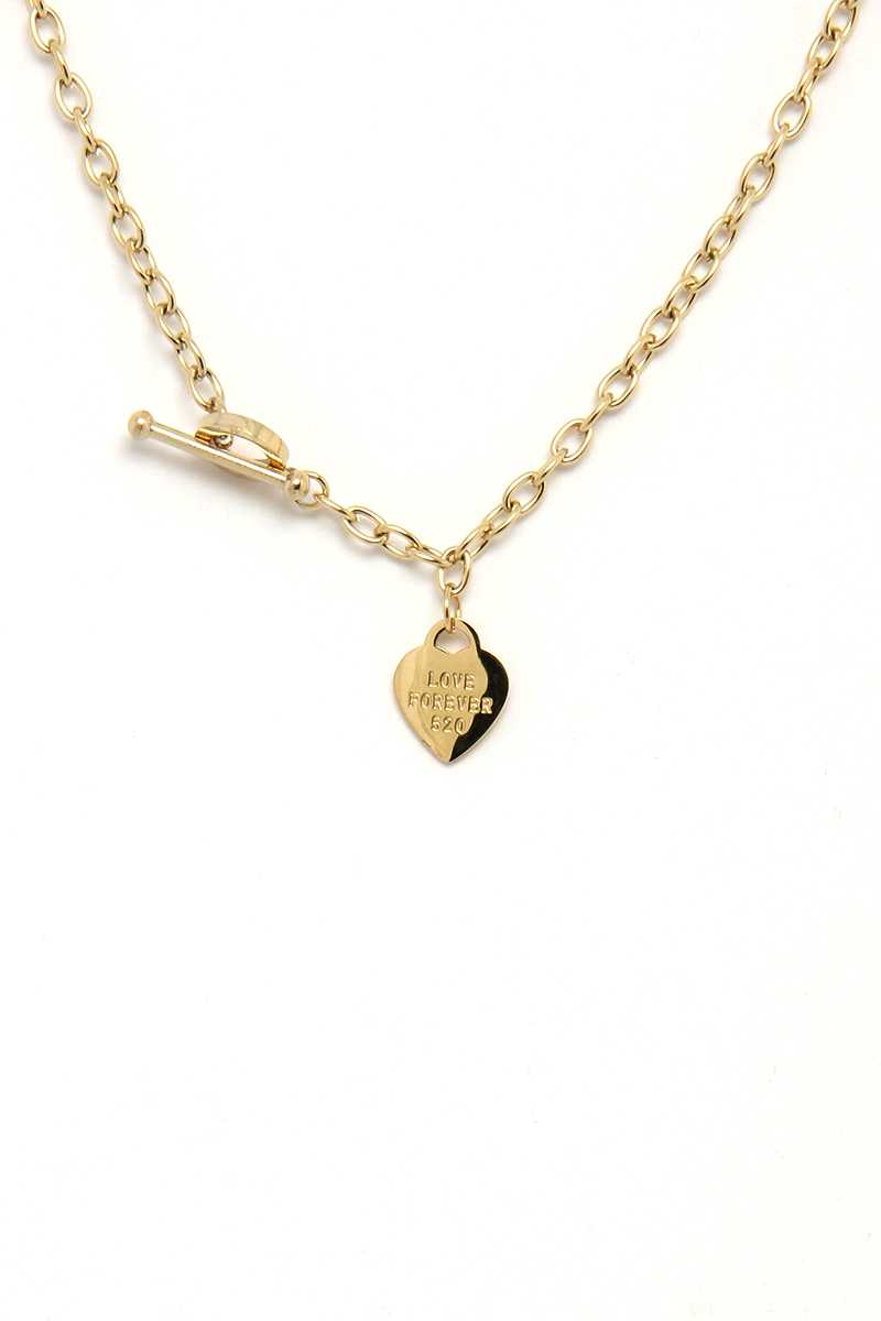 Collier à fermoir à bascule en métal avec pendentif coeur de mode