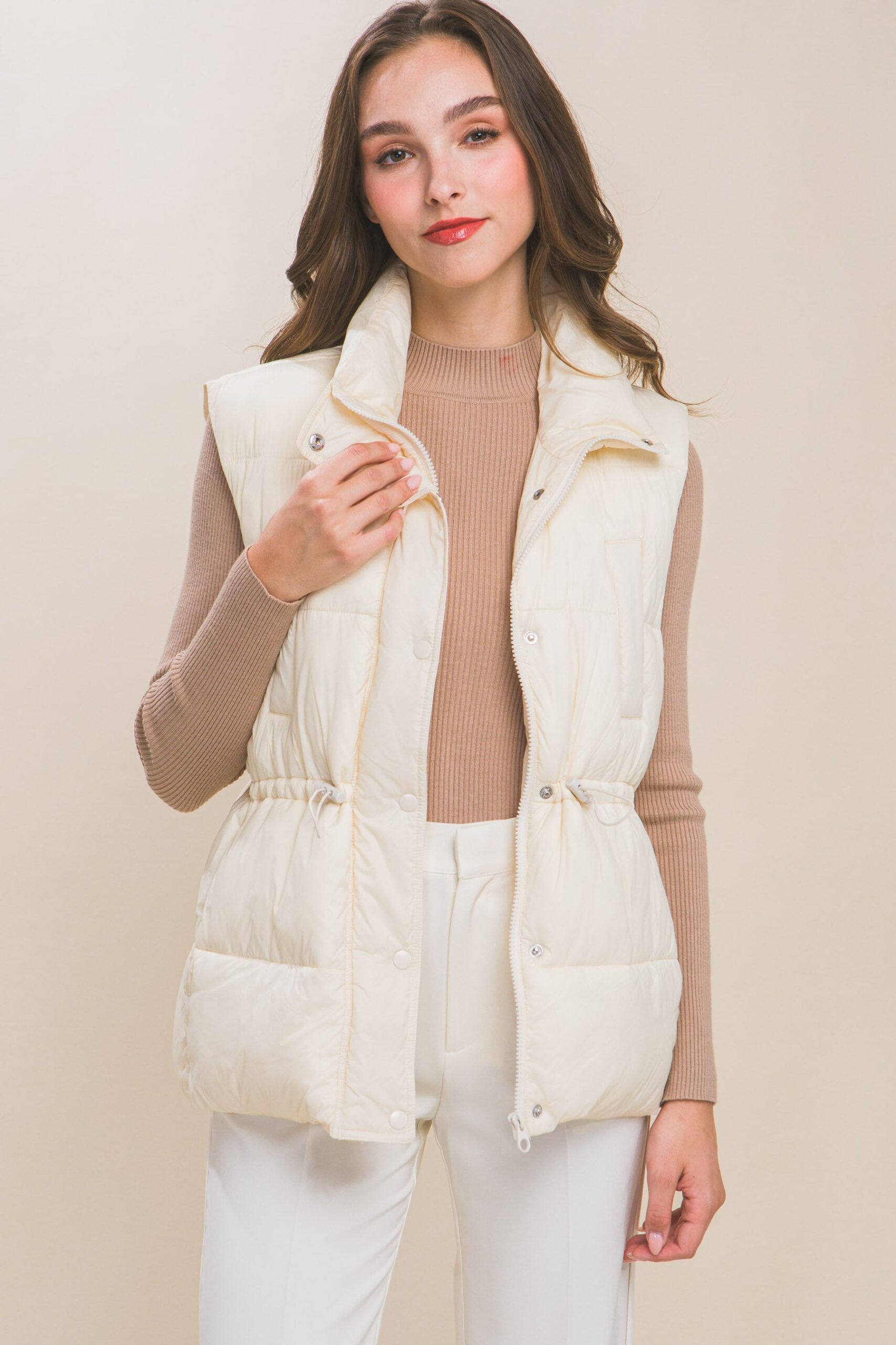 Doudoune boutonnée zippée avec boutons à la taille