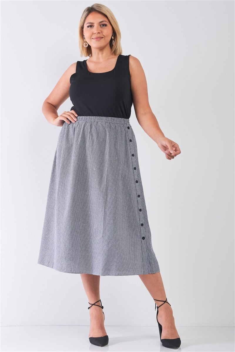 Jupe mi-longue noire à imprimé vichy et boutons latéraux de grande taille
