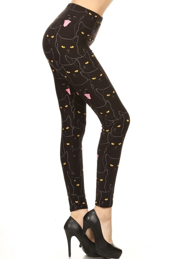 Legging taille haute imprimé chats noirs dans un style ajusté, avec une taille élastique