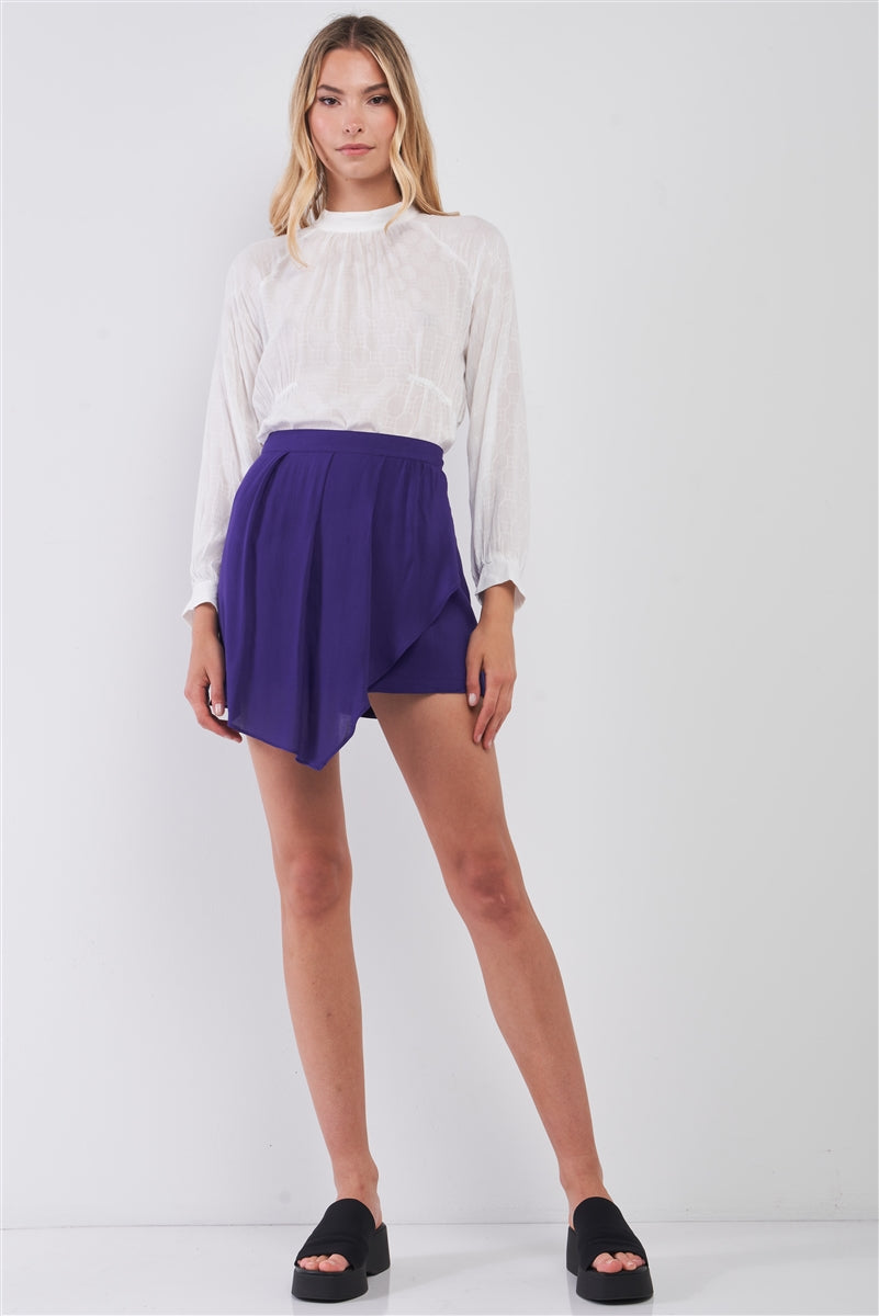 Mini-jupe portefeuille asymétrique taille haute violette plissée sur le devant