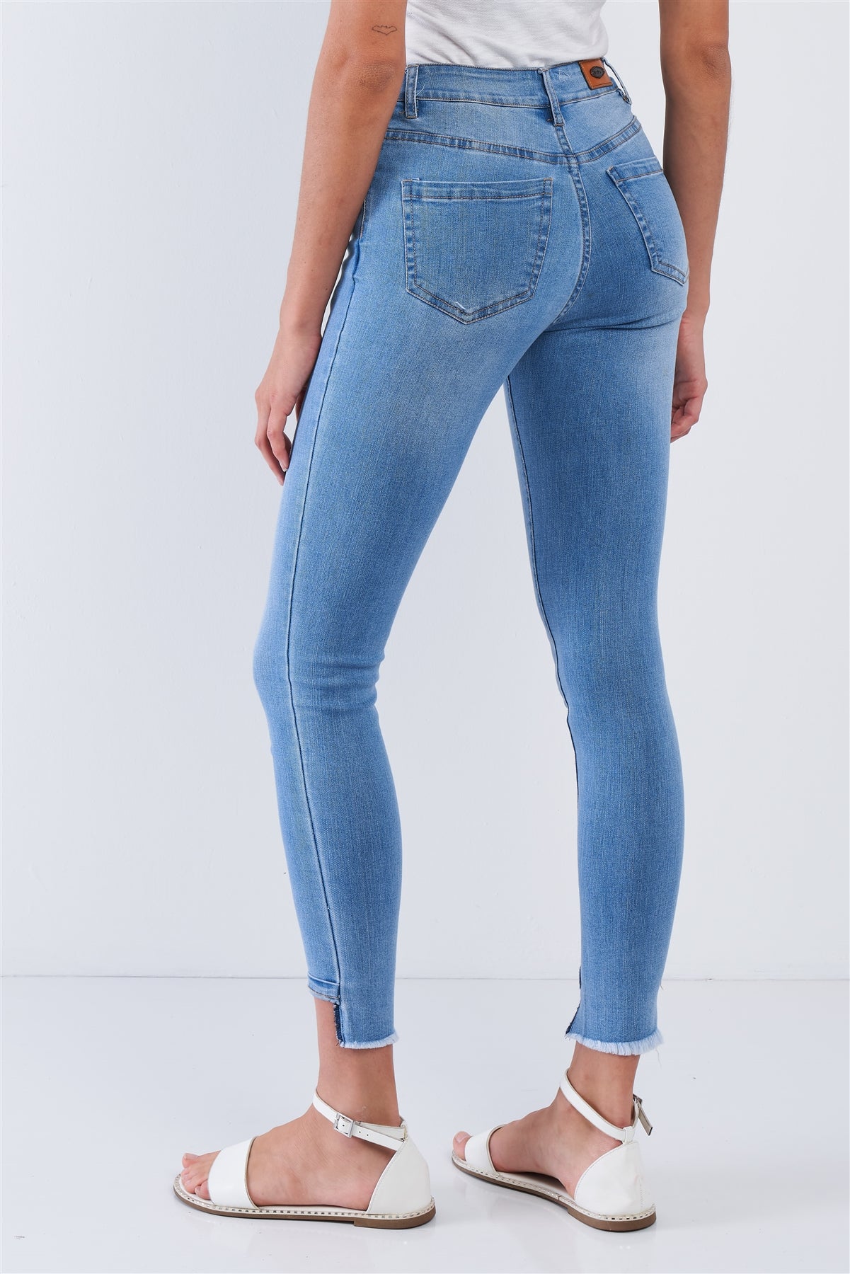Pantalon en jean asymétrique à franges