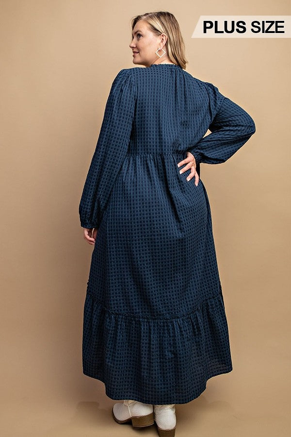 Robe longue boutonnée à carreaux avec ourlet bas