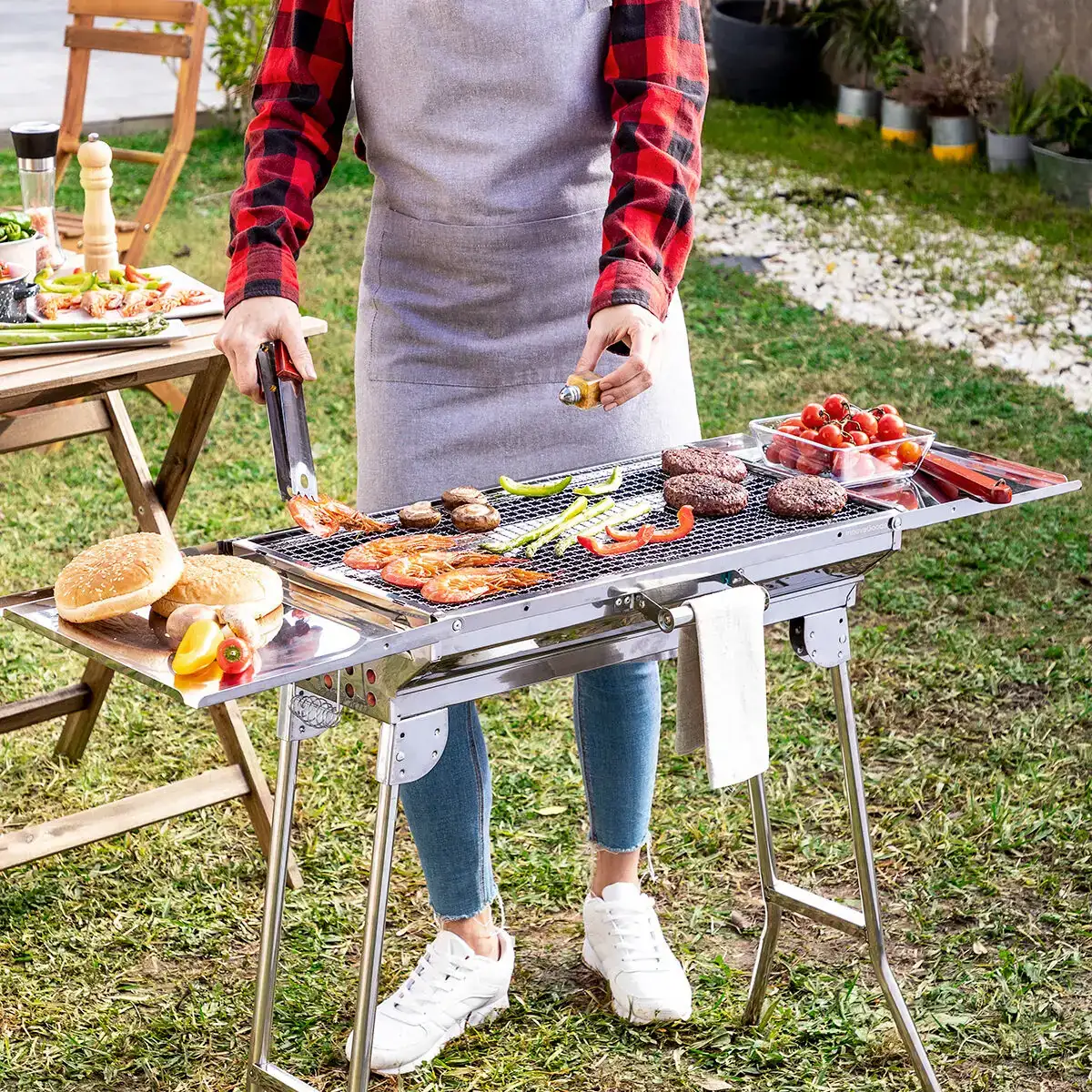 Barbecue au charbon de bois pliable en acier inoxydable exelq innovagoods_2318. DIAYTAR COTE D'IVOIRE - Où la Qualité et la Diversité Fusionnent. Explorez notre boutique en ligne pour découvrir une gamme variée de produits qui incarnent l'excellence et l'authenticité.