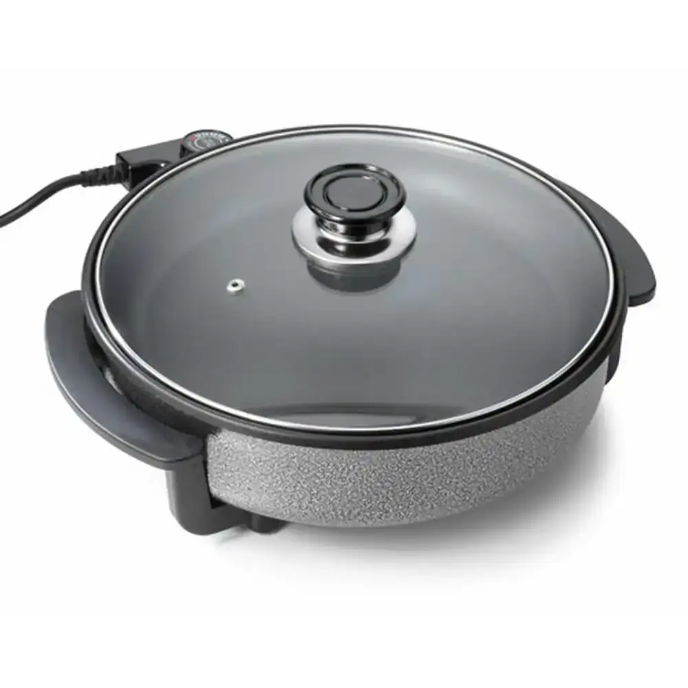 Casserole electrique multifonctions tristar 1500w o 30 cm _5763. Bienvenue chez DIAYTAR COTE D'IVOIRE - Où Chaque Objet a son Histoire. Découvrez notre sélection méticuleuse et choisissez des articles qui racontent l'âme du Côte d'Ivoire.