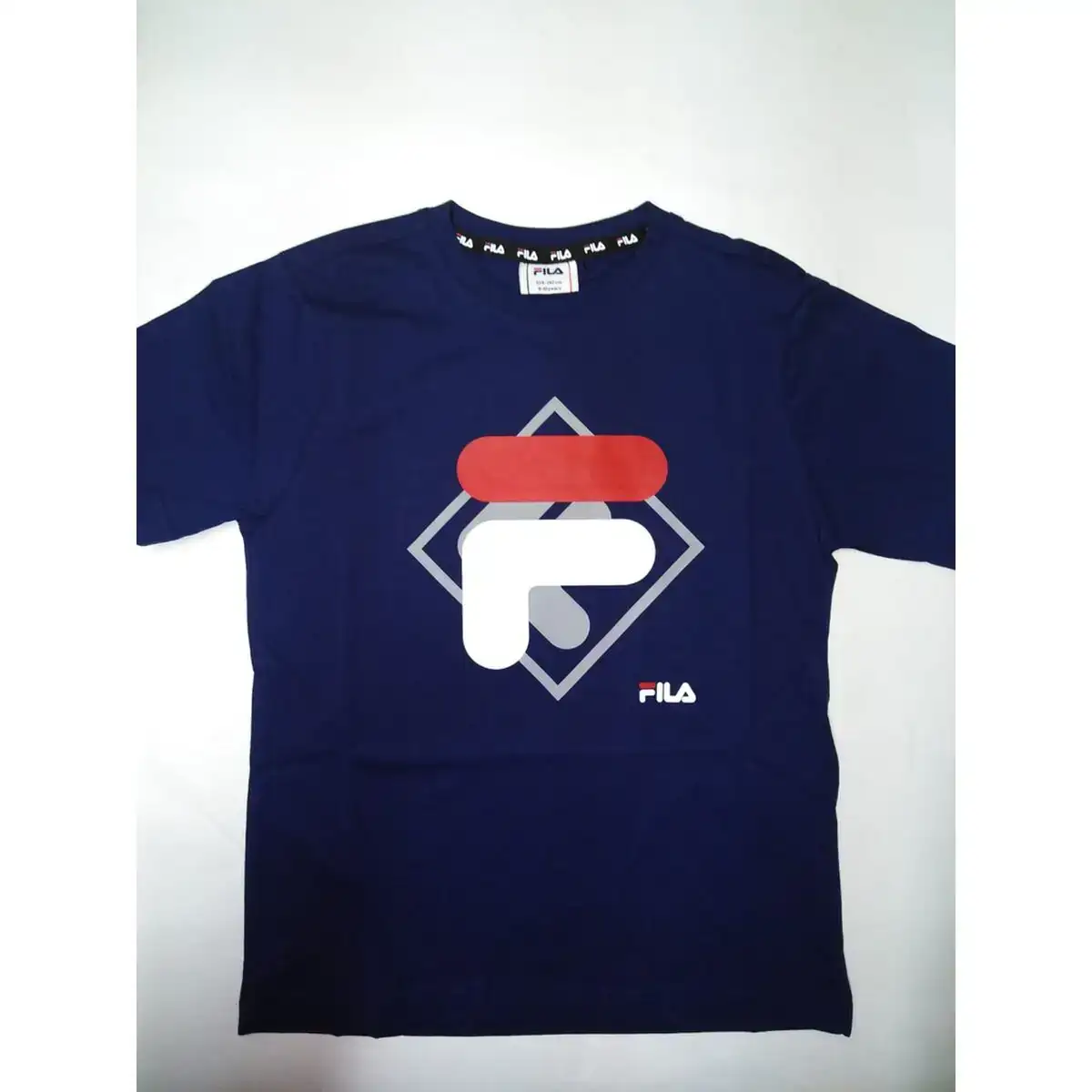 Shirt a manches courtes enfant fila fa0340 50001 blue marine_2020. DIAYTAR COTE D'IVOIRE - L'Art de Choisir, l'Art de Se Distinquer. Naviguez à travers notre catalogue et choisissez des produits qui ajoutent une note d'élégance à votre style unique.