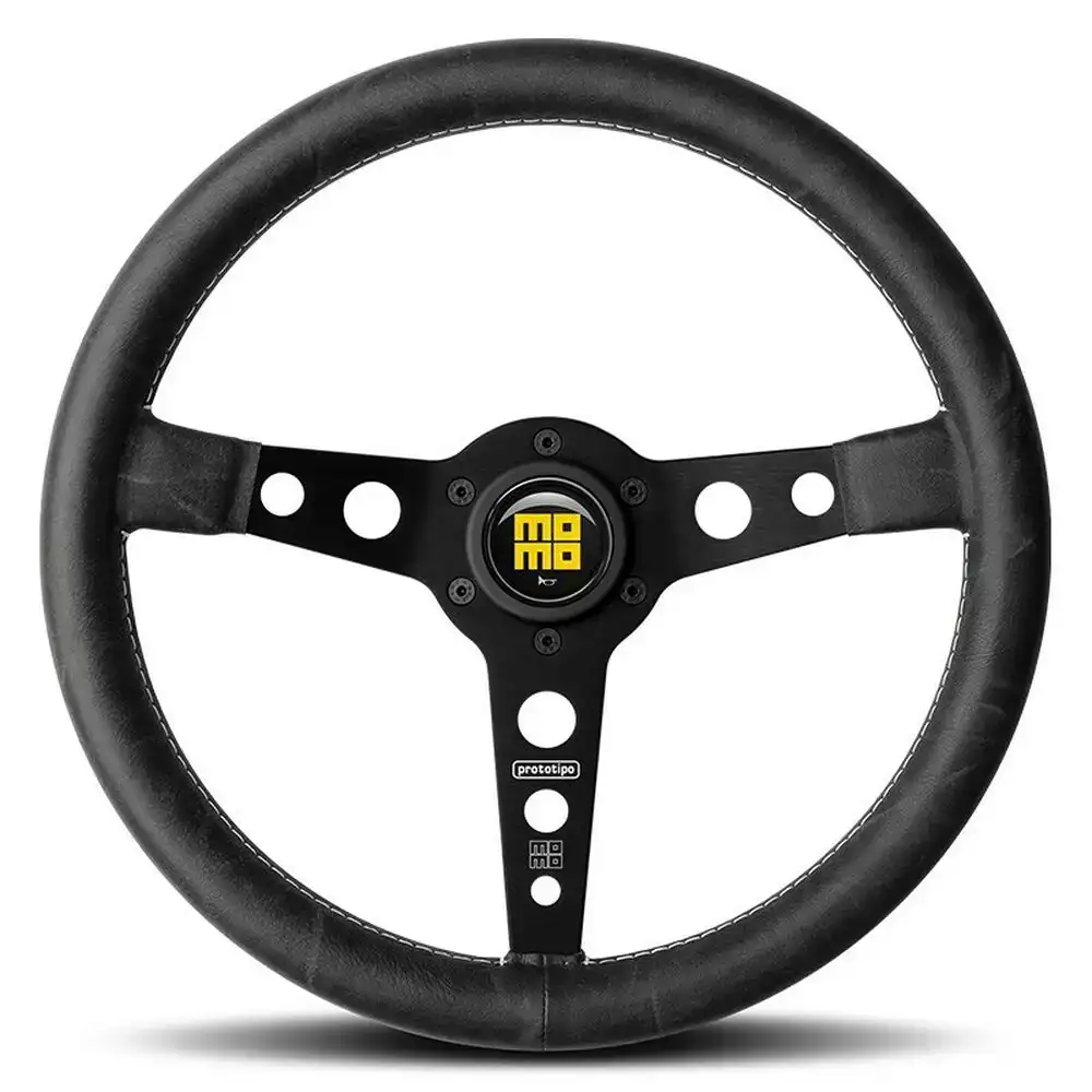 Volant racing momo prototipo heritage noir o 35 cm_8158. Entrez dans l'Univers de DIAYTAR COTE D'IVOIRE - Où l'Élégance Rencontre la Tradition. Explorez notre gamme variée et trouvez des articles qui ajoutent une touche de sophistication à votre vie.