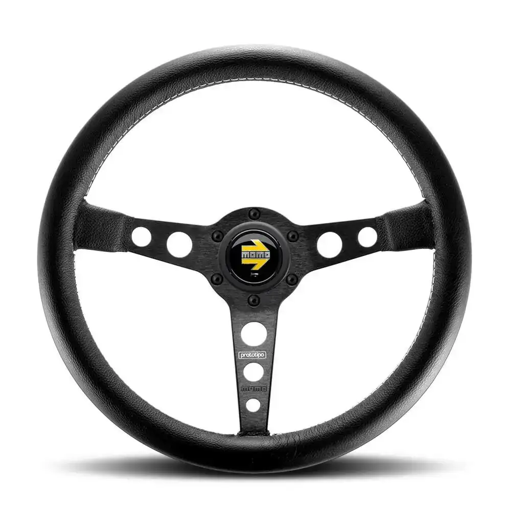 Volant racing momo prototipo o 35 cm_3067. DIAYTAR COTE D'IVOIRE - Où Choisir est un Plaisir. Explorez notre boutique en ligne et choisissez parmi des produits de qualité qui satisferont vos besoins et vos goûts.