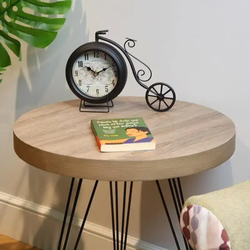 Horloge de table versa black bicycle iron 10 x 23 x 29 cm_9869. DIAYTAR COTE D'IVOIRE - Votre Plaisir Shopping à Portée de Clic. Explorez notre boutique en ligne et trouvez des produits qui ajoutent une touche de bonheur à votre vie quotidienne.