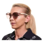 Lunettes de soleil unisexe web eyewear marron dore o 59 mm_1312. DIAYTAR COTE D'IVOIRE - Là où Chaque Achat Contribue à un Rêve. Naviguez à travers notre boutique en ligne et soutenez des artisans talentueux tout en acquérant des trésors.