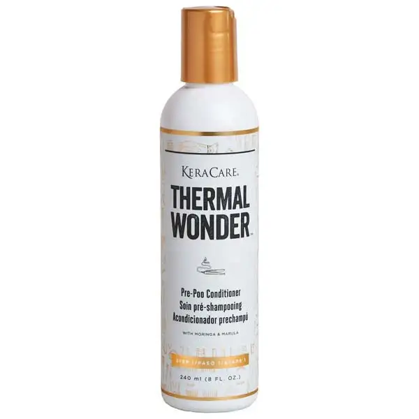 Shampoing au moringa et marula 240 ml_8229. DIAYTAR COTE D'IVOIRE - L'Art de Vivre le Shopping Authentique. Découvrez notre boutique en ligne et trouvez des produits qui célèbrent la culture et l'héritage du Côte d'Ivoire.