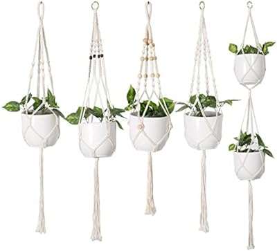 Cintre pour plantes en macramé paquet de 5 cintres sans odeur. DIAYTAR COTE D'IVOIRE, la référence en matière de shopping discount en ligne. Découvrez notre vaste sélection de produits allant de la maison à l'informatique, en passant par l'électroménager et la mode. Avec des prix défiant toute concurrence, vous pourrez satisfaire toutes vos envies sans vous ruiner. Faites des économies tout en achetant des produits de qualité chez DIAYTAR COTE D'IVOIRE .