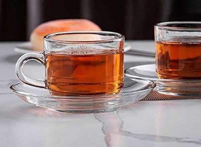 Ensemble tasse à thé et 6 soucoupes roma en verre transparent. DIAYTAR COTE D'IVOIRE  est le rendez-vous incontournable des chasseurs de bonnes affaires. Parcourez notre catalogue en ligne et trouvez tout ce dont vous avez besoin pour équiper votre maison, de l'électroménager à l'informatique en passant par les dernières tendances en matière de mode. Profitez de nos prix discounts pour réaliser de véritables économies.