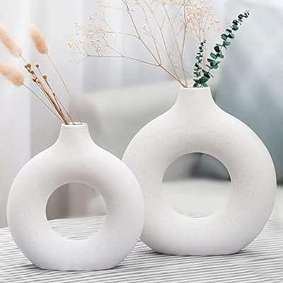 Plateau créatif donut vase en céramique creux nordique rond petit blanc. Explorez DIAYTAR COTE D'IVOIRE, la boutique en ligne généraliste idéale pour les amateurs de bonnes affaires. Que vous soyez à la recherche d'appareils électroménagers, de produits informatiques ou de vêtements à la mode, notre sélection variée et notre politique de prix discount vous combleront.