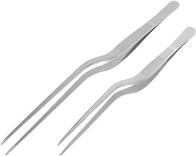 Yarno 2 pièces pinces de cuisine en acier inoxydable professionnelles longues pour griller la cuisson. DIAYTAR COTE D'IVOIRE, la boutique en ligne polyvalente qui répond à tous vos besoins d'articles ménagers à bas prix. Des ustensiles de cuisine pratiques aux produits d'entretien essentiels, nous avons tout ce dont vous avez besoin pour faciliter votre quotidien sans dépenser une fortune. Ne manquez pas nos bonnes affaires !