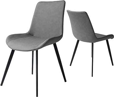 Ensemble de chaises de salle à manger modernes rembourrées en similicuir avec pieds en métal pour salon. DIAYTAR COTE D'IVOIRE  est votre guichet unique pour des produits discount de premier ordre. Parcourez notre catalogue en ligne et découvrez notre sélection soigneusement choisie d'articles pour la maison, l'électroménager, l'informatique et la mode, tous disponibles à des prix abordables. Vous ne trouverez pas de meilleurs deals ailleurs !