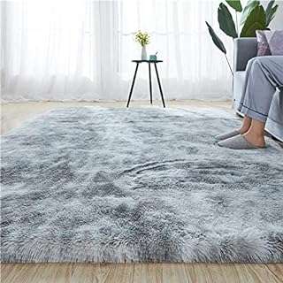 Tapis à poils longs doux et antidérapant design moderne fausse fourrure pour salon. Révolutionnez votre façon de magasiner en ligne avec DIAYTAR COTE D'IVOIRE . Notre plateforme propose une multitude de produits discount, allant des appareils ménagers aux accessoires de mode à des prix défiant toute concurrence. Profitez de l'expérience shopping idéale tout en réalisant des économies importantes.