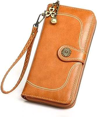 Petit portefeuille en cuir sunnelette pour femme avec porte cartes marron représentant une époque. Privilégiez le style sans vous ruiner avec DIAYTAR COTE D'IVOIRE . Notre boutique en ligne propose une sélection de produits mode et gadgets à des prix défiant toute concurrence. Vous trouverez chez nous les tendances du moment à des tarifs abordables. Profitez de cette opportunité et faites-vous plaisir sans vous ruiner.