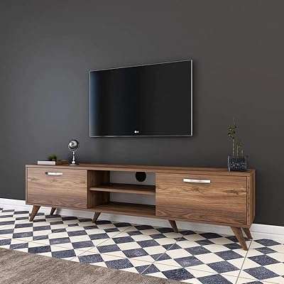 Meuble tv autoportant moderne home canvas 180 cm (noyer). Vous cherchez des produits discount de qualité ? Ne cherchez plus, DIAYTAR COTE D'IVOIRE  est là pour vous. Notre boutique en ligne généraliste propose une large gamme d'articles allant de la maison à l'informatique en passant par l'électroménager et la mode. Faites des économies sans compromettre la qualité grâce à notre sélection minutieusement choisie de produits à prix réduits. Profitez des avantages du shopping en ligne avec DIAYTAR COTE D'IVOIRE .