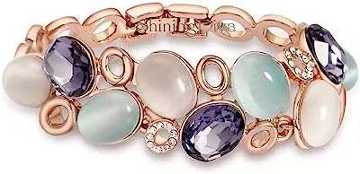Bracelet en cristal autrichien plaqué or rose shinening diva fashion pour femmes et filles. DIAYTAR COTE D'IVOIRE  - La boutique en ligne qui rend le shopping abordable! Découvrez notre sélection de produits discount, comprenant des équipements informatiques, des appareils électroménagers, des vêtements tendance et bien plus encore, tous à des prix défiant toute concurrence.