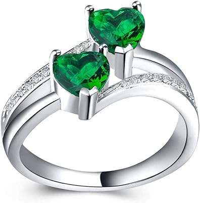 Une bague pour femme plaquée or blanc ornée de zircons en forme. DIAYTAR COTE D'IVOIRE  - La boutique en ligne où qualité et discount se rencontrent. Parcourez notre vaste catalogue et trouvez tout ce dont vous avez besoin, de l'électroménager moderne à la dernière mode tendance. Ne sacrifiez pas votre budget pour obtenir des produits de qualité !