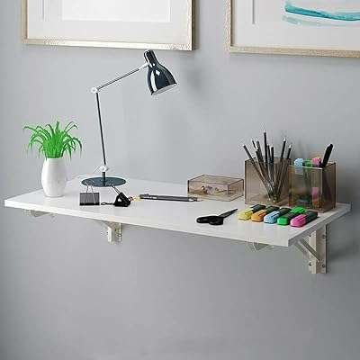 Table de bureau pliante murale 90 x 50 cm blanc. Faites de bonnes affaires dès aujourd'hui avec DIAYTAR COTE D'IVOIRE  ! Parcourez notre boutique en ligne généraliste où vous trouverez une large gamme de produits discount, des articles pour la maison à l'électroménager, en passant par l'informatique et la mode. Profitez de nos prix compétitifs et offrez-vous des produits de qualité à moindre coût.