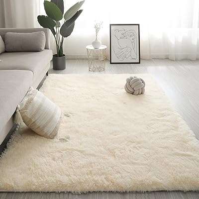 Grand tapis à poils longs super doux et teint par nœuds. DIAYTAR COTE D'IVOIRE, votre boutique en ligne de confiance pour tous vos besoins en produits discount. Parcourez notre sélection minutieusement choisie pour trouver des articles de qualité pour la maison, l'électroménager, l'informatique, la mode et les gadgets, le tout à des prix avantageux. Simplifiez vos achats en ligne avec DIAYTAR COTE D'IVOIRE  et réalisez des économies dès maintenant.