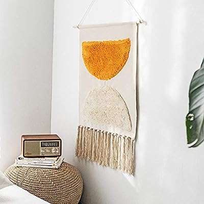 Art mural à franges bohème fait la main décoration murale suspendre de chambre. En quête de produits discount de qualité ? DIAYTAR COTE D'IVOIRE  est là pour vous satisfaire ! Explorez notre boutique en ligne et découvrez notre vaste gamme de produits pour la maison, l'électroménager, l'informatique et la mode. Obtenez des articles de dernière tendance à des prix incroyables et faites des économies substantielles.