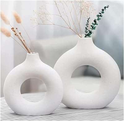 Sihia life grand vase à fleurs au design simple et moderne ensemble de 2. Maximisez votre budget chez DIAYTAR COTE D'IVOIRE, votre destination en ligne pour des affaires imbattables. Nous vous offrons une gamme complète de produits discount, allant des articles de la maison à l'électroménager, de l'informatique à la mode. Faites des économies sans compromettre la qualité avec DIAYTAR COTE D'IVOIRE !