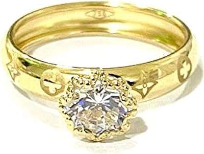 Bague de fiançailles au design élégant en or pur 18 carats. Découvrez DIAYTAR COTE D'IVOIRE, votre magasin en ligne de confiance pour des bons plans à ne pas manquer. Explorez nos multiples catégories telles que l'électroménager, le mobilier, l'informatique et la mode, et dénichez les offres les plus avantageuses pour tous vos besoins, le tout en un seul endroit.