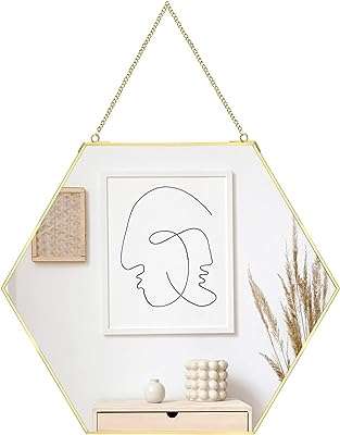 & miroir de décoration murale à suspendre géométrique en métal doré. Faites des économies sans compromettre votre satisfaction avec DIAYTAR COTE D'IVOIRE . Notre boutique en ligne propose une variété de produits discount dans différentes catégories, de l'électronique à la mode. Trouvez tout ce dont vous avez besoin à des prix imbattables !