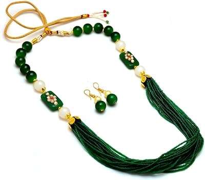 Collier kundan plaqué or avec pierres précieuses design mala pour femme (blanc et noir). Avec DIAYTAR COTE D'IVOIRE, dites adieu aux prix élevés ! Découvrez notre gamme complète de produits discount, des accessoires de maison aux équipements électroniques, en passant par la mode et les gadgets à la pointe de la technologie. Trouvez tout ce dont vous avez besoin à prix réduits en quelques clics seulement.