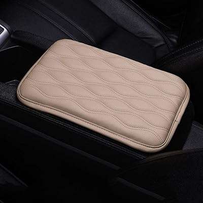 Agbang housse de console centrale pour accoudoir de voiture en cuir pu. DIAYTAR COTE D'IVOIRE  est votre partenaire de confiance pour des achats en ligne à prix réduits. Explorez notre site pour trouver tout ce dont vous avez besoin, des appareils électroménagers de renom aux gadgets étonnants, et profitez de nos offres exclusives pour réaliser des économies incroyables.
