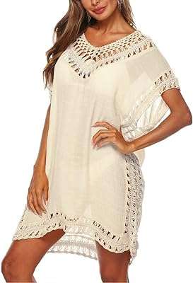 Robe de plage ample pour femmes couleur unie tunique de dissimulation pour bikini. Découvrez DIAYTAR COTE D'IVOIRE, votre boutique en ligne généraliste offrant une sélection impressionnante de produits discount. Que vous recherchiez des articles pour votre maison, des appareils électroménagers à la pointe de la technologie, des équipements informatiques ou même les dernières tendances de la mode et les gadgets les plus cool, nous avons tout ce dont vous avez besoin, à des prix incroyablement bas !
