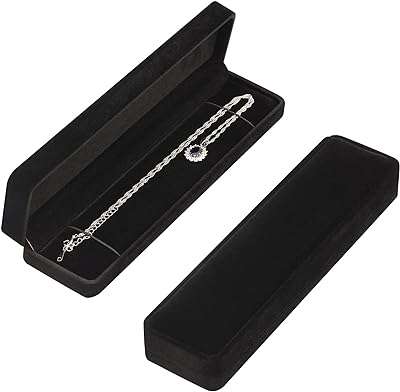 Longue chaîne de bijoux en velours coffret cadeau pochette de rangement pour bracelet. DIAYTAR COTE D'IVOIRE  - votre guichet unique en ligne pour des produits discount irrésistibles. Parcourez notre large éventail de gadgets innovants, d'équipements ménagers pratiques et de vêtements tendance à prix cassés. Ne manquez pas cette opportunité de faire de bonnes affaires et de réaliser des économies considérables.