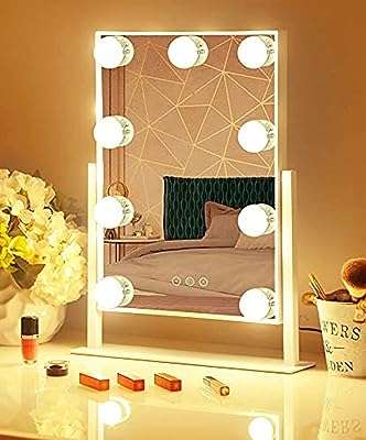 Miroir de courtoisie moonmoon hollywood avec lumières maquillage professionnel et table. DIAYTAR COTE D'IVOIRE, la boutique en ligne polyvalente qui répond à tous vos besoins d'articles ménagers à bas prix. Des ustensiles de cuisine pratiques aux produits d'entretien essentiels, nous avons tout ce dont vous avez besoin pour faciliter votre quotidien sans dépenser une fortune. Ne manquez pas nos bonnes affaires !