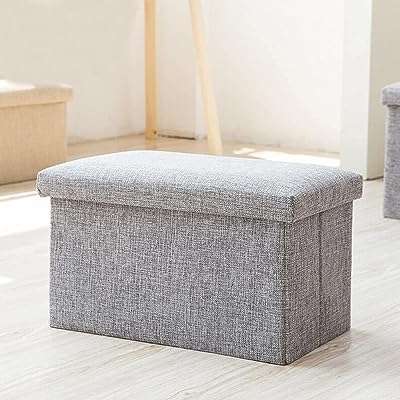 Repose pieds ottoman de rangement pliable boîte pliable peu encombrante ottomane rembourrée en mousse. DIAYTAR COTE D'IVOIRE  vous offre une expérience d'achat en ligne unique en proposant une multitude de produits discount dans différents domaines. Faites-vous plaisir sans vous ruiner en choisissant parmi notre sélection de produits pour la maison, l'électroménager, l'informatique, la mode et bien plus encore.