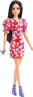 Poupée barbie fashionistas longs cheveux noirs robe fleurie multicolore à manches. Faites des économies sur tous vos achats avec DIAYTAR COTE D'IVOIRE . Notre boutique en ligne vous propose des articles de qualité à prix cassés, que ce soit pour votre maison, l'électroménager, l'informatique ou encore la mode. Ne cherchez plus ailleurs, les meilleures offres discount sont chez nous !