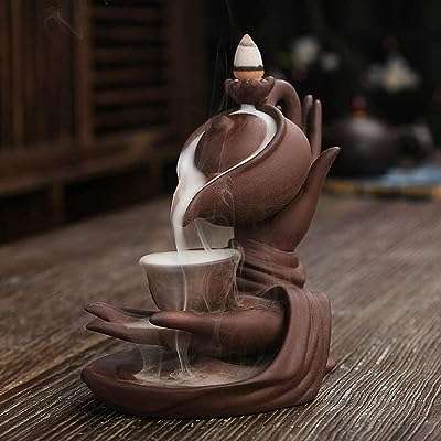 Brûleur d'encens créatif en céramique série main de bouddha design. Bienvenue sur DIAYTAR COTE D'IVOIRE, le site idéal pour les amateurs de bonnes affaires ! Avec une large gamme de produits discount pour la maison, l'électroménager, l'informatique, la mode et les gadgets, nous offrons une solution pratique pour économiser sans renoncer à la qualité. N'attendez plus, explorez notre sélection et profitez de prix imbattables.