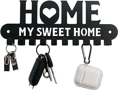 Sweet home design porte clés en métal noir crochets porte d'entrée cuisine. Parfaitement adapté aux chasseurs de bonnes affaires, DIAYTAR COTE D'IVOIRE  vous offre une expérience de shopping en ligne unique. Notre sélection abondante de produits discount, incluant des articles essentiels pour la maison, l'électroménager, l'informatique, la mode et les gadgets, garantit que vous trouverez ce que vous cherchez sans vous ruiner.