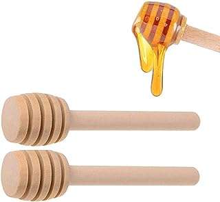 Couverts en bois 2 pièces avec cuillère à mélanger pour miel. Parfaitement adapté aux chasseurs de bonnes affaires, DIAYTAR COTE D'IVOIRE  vous offre une expérience de shopping en ligne unique. Notre sélection abondante de produits discount, incluant des articles essentiels pour la maison, l'électroménager, l'informatique, la mode et les gadgets, garantit que vous trouverez ce que vous cherchez sans vous ruiner.