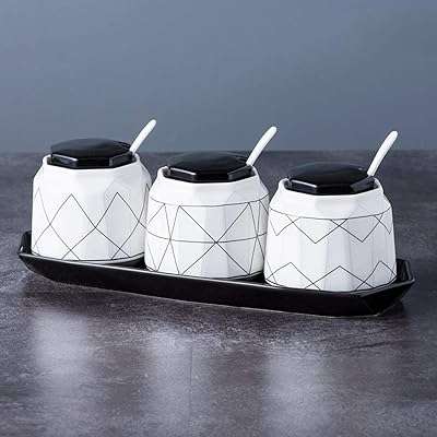 Pots à épices en céramique avec cuillères de service et couvercle. DIAYTAR COTE D'IVOIRE, votre boutique en ligne discount pour tous les accros du shopping à petits prix. Découvrez notre vaste choix de produits dans toutes les catégories, allant des articles de décoration aux appareils électroménagers en passant par les vêtements et les jouets. Faites des économies tout en comblant vos envies grâce à nos offres exclusives et notre rapport qualité-prix exceptionnel.