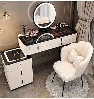 Coiffeuse pliante avec tiroirs et chaise avec haut parleur bluetooth chargeur sans fil. Faites des bonnes affaires en un clic avec DIAYTAR COTE D'IVOIRE  ! Notre boutique en ligne généraliste vous propose une large gamme de produits discount, de l'électroménager à l'informatique en passant par la mode et les gadgets. N'attendez plus pour économiser et équiper votre maison à prix réduits, sans compromis sur la qualité !