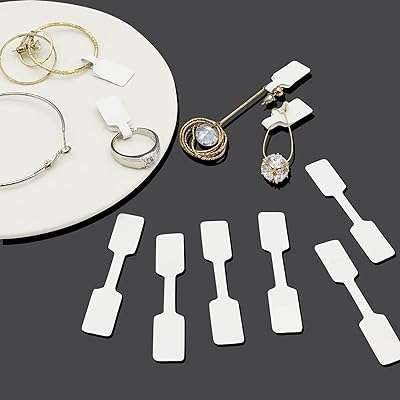 Étiquettes de prix 500 unités d'étiquettes de prix de bijoux autocollantes vierges blanches pour bagues. Avec DIAYTAR COTE D'IVOIRE, vous pouvez acheter intelligemment tout en restant dans votre budget. Notre boutique en ligne propose une sélection de produits discount pour la maison, l'électroménager, l'informatique et la mode, avec des prix attractifs. Parcourez notre collection dès maintenant et trouvez tout ce dont vous avez besoin à moindre coût !