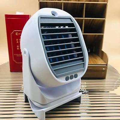 Mini climatiseur rotatif à 360 degrés ventilateur fréon 2 en 1 blanc et gris. Rencontrez les bonnes affaires chez DIAYTAR COTE D'IVOIRE  – votre destination en ligne pour des produits discount pour tous les aspects de votre vie. Découvrez notre sélection variée d'articles pour la maison, allant des appareils électroménagers indispensables aux éléments décoratifs élégants. Restez connecté avec notre gamme d'appareils informatiques à prix imbattables, et ravivez votre style avec des vêtements et accessoires tendance à petit prix. Faites des économies tout en obtenant la qualité que vous méritez !
