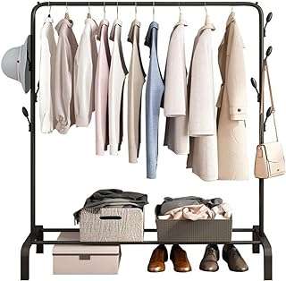 Portant à vêtements polyvalent sky touch avec étagères inférieures cintre en métal sur pied. DIAYTAR COTE D'IVOIRE  vous offre un large choix de produits discount, allant des appareils électroménagers dernier cri aux vêtements à la mode en passant par les gadgets les plus innovants. Faites vos achats en ligne en toute simplicité et bénéficiez de prix avantageux pour équiper votre maison avec style, sans vous ruiner.