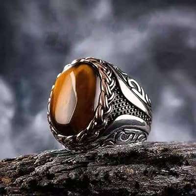 Bague classique en argent sterling 925 incrustée de pierre d'oeil de tigre. DIAYTAR COTE D'IVOIRE, la boutique en ligne où vous trouverez tout ce dont vous avez besoin à petit prix ! Profitez de notre sélection discount de produits pour la maison, l'électroménager, l'informatique, la mode et les gadgets, sans pour autant compromettre la qualité. Faites de bonnes affaires tout en profitant d'une expérience de shopping pratique et sécurisée.